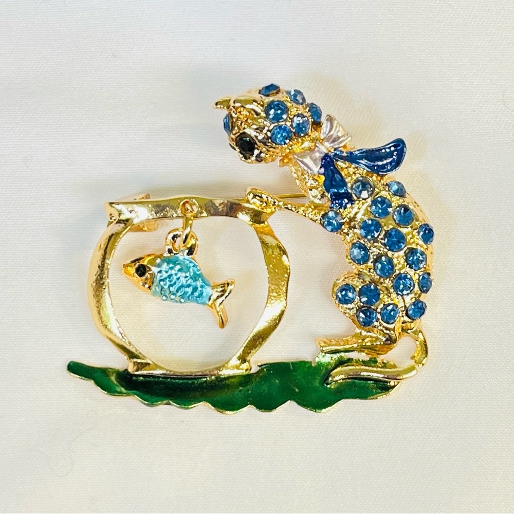 Brooch, Cat and Fish, NIP, blue rhinestones on golden base, 1.75x1.5”